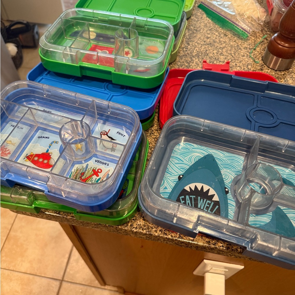 Yumbox Kids Lunch Box with various designs and colors